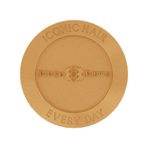 Gold token with the words