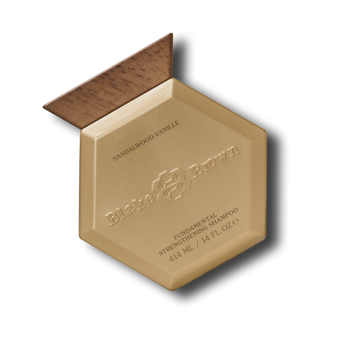 Cut-out shot of Blake Brown's Strengthening Shampoo, known for its gorgeous Sandalwood Vanille fragrance.