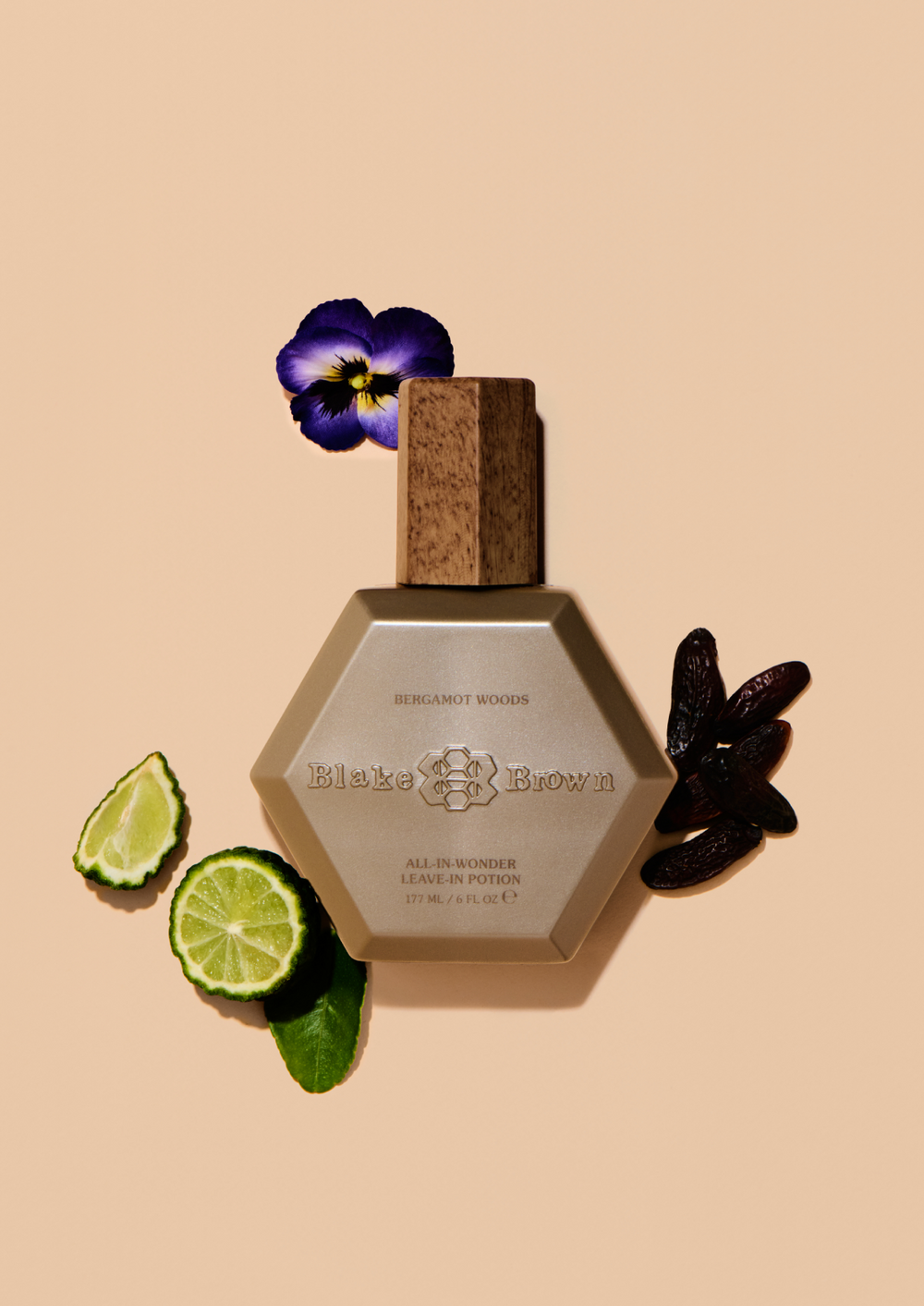 Blake Brown All-In-Wonder Leave-In Potion, styled with violet, tonka beans, and bergamot.