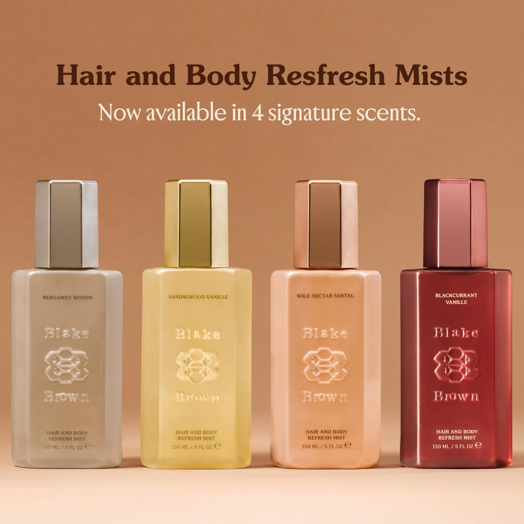 Four bottles of Blake Brown hair and body refresh mists on a beige background with text about signature scents.