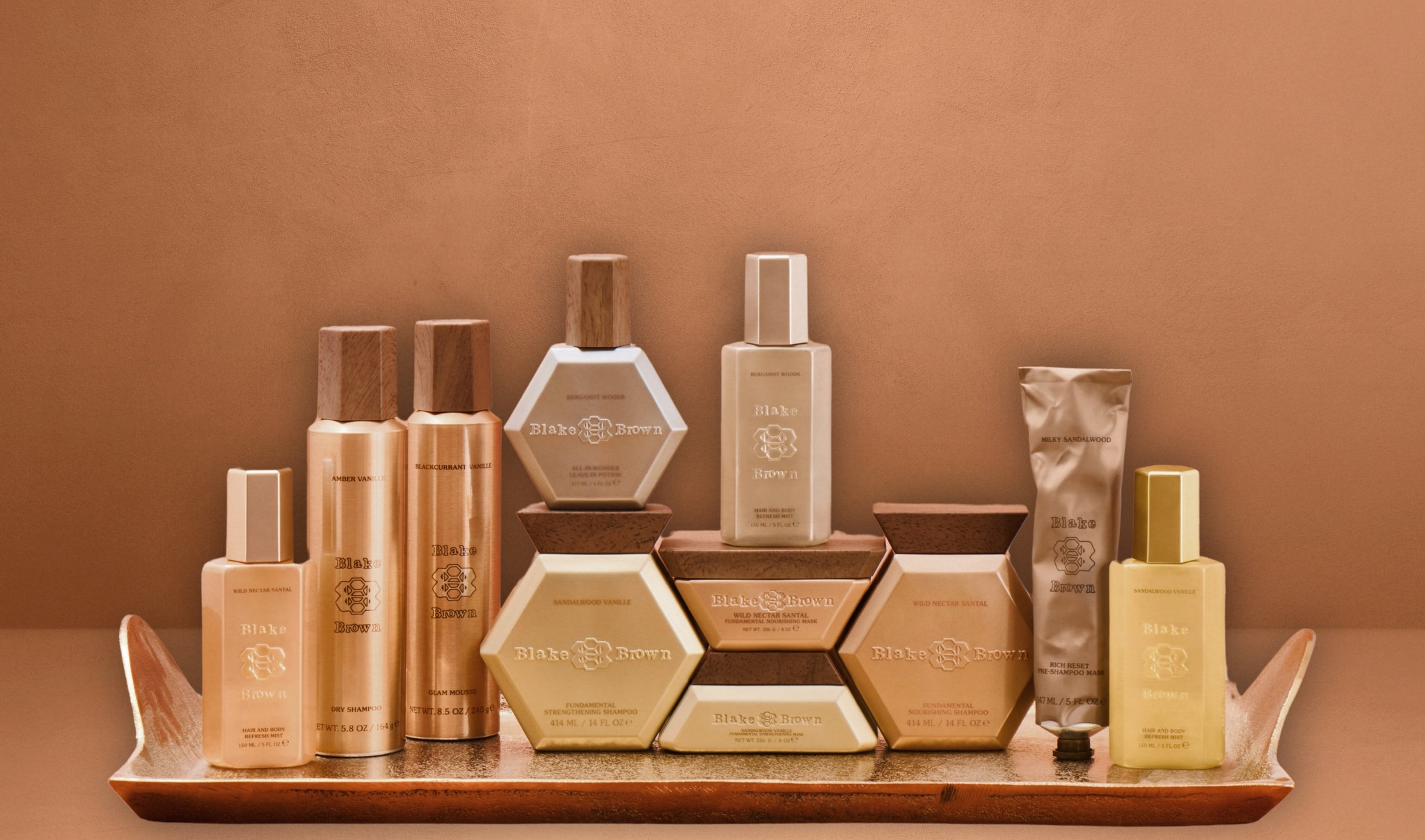 The full set of Blake Brown haircare products, including shampoos, masks, styling aids, and hair and body mists.